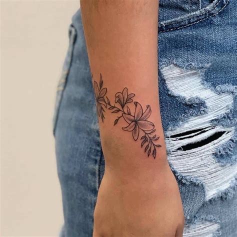 flower wrist tattoos